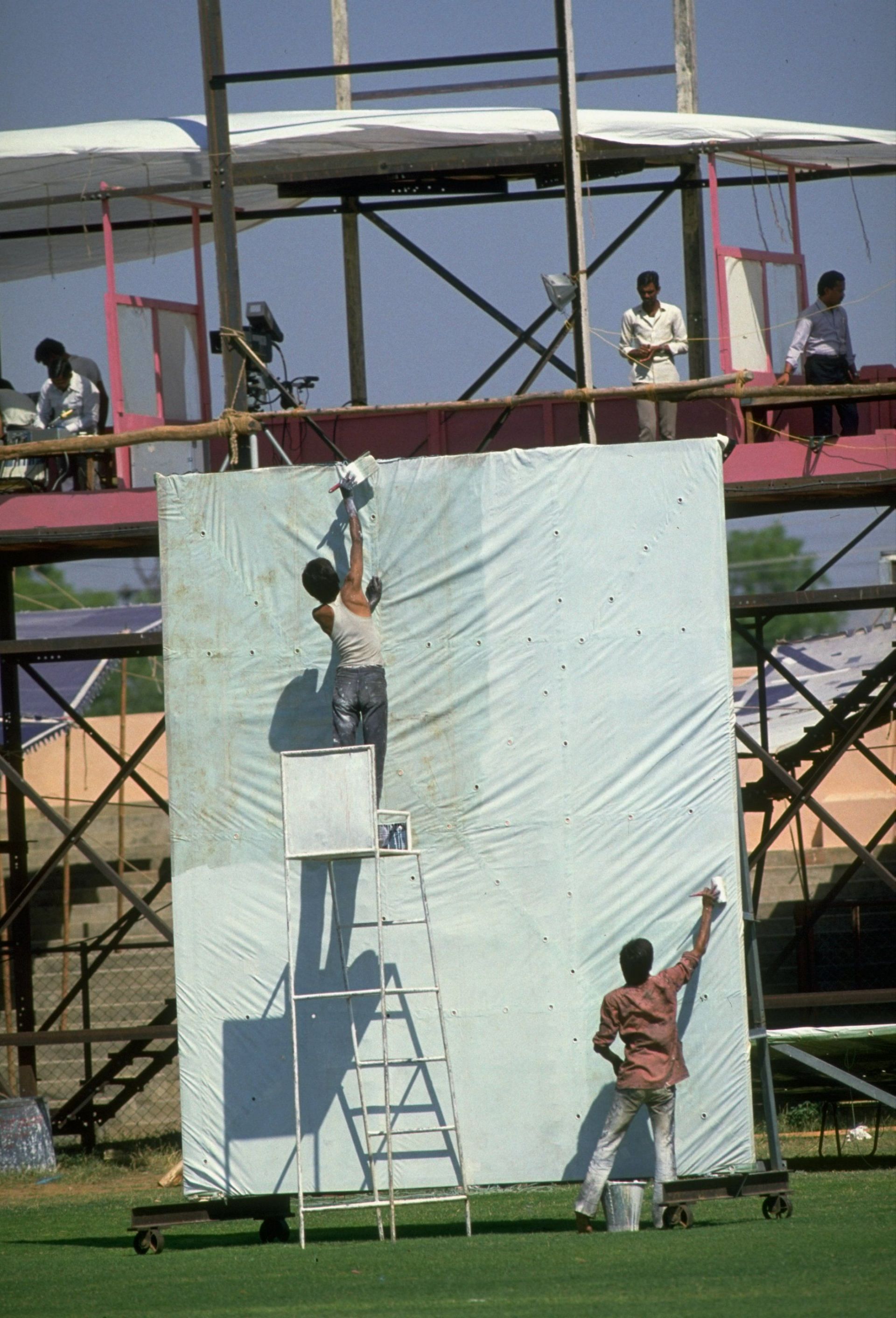 A sightscreen being painted during the 1987 World Cup.